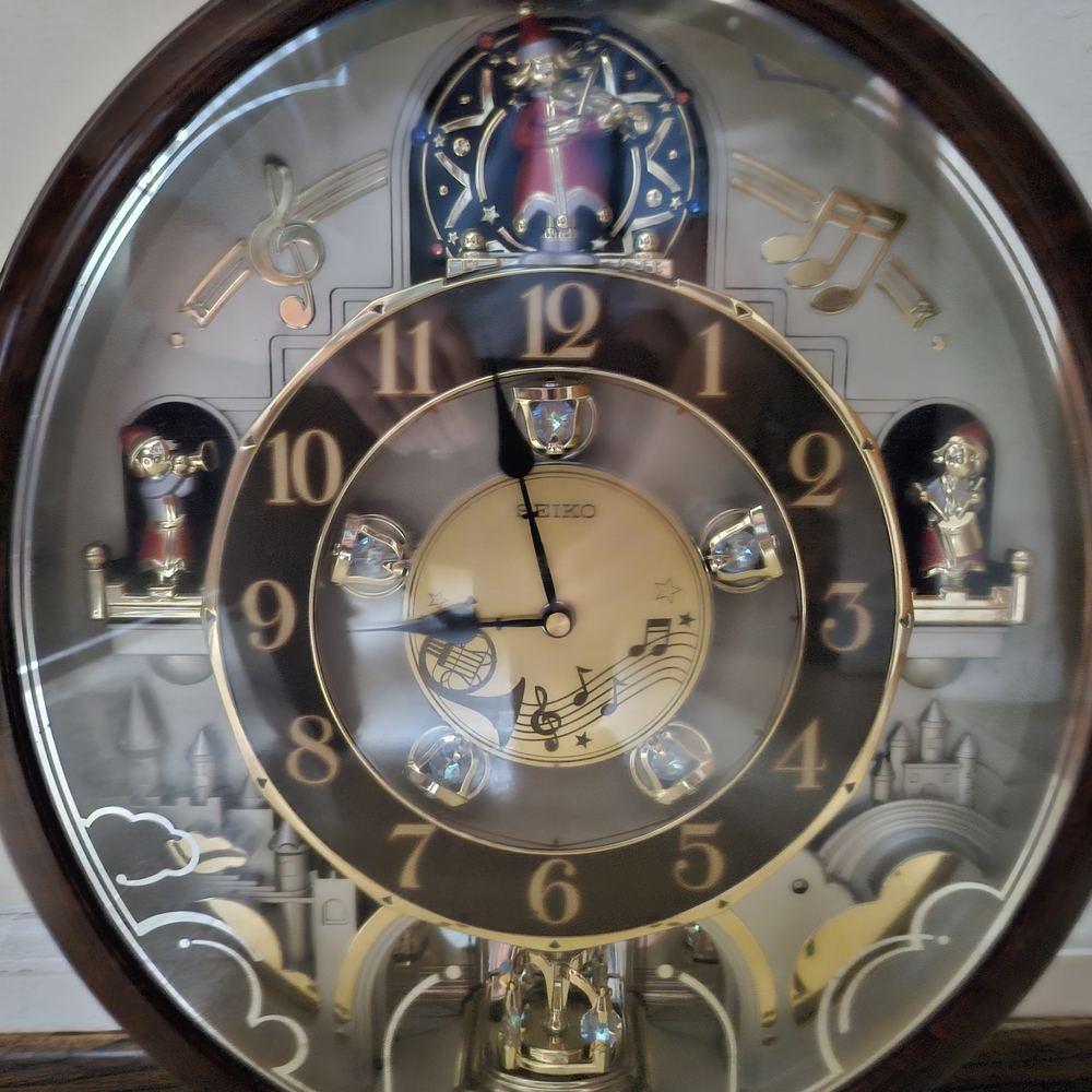 Seiko Musical Wall Clock with Gold and Black Accents